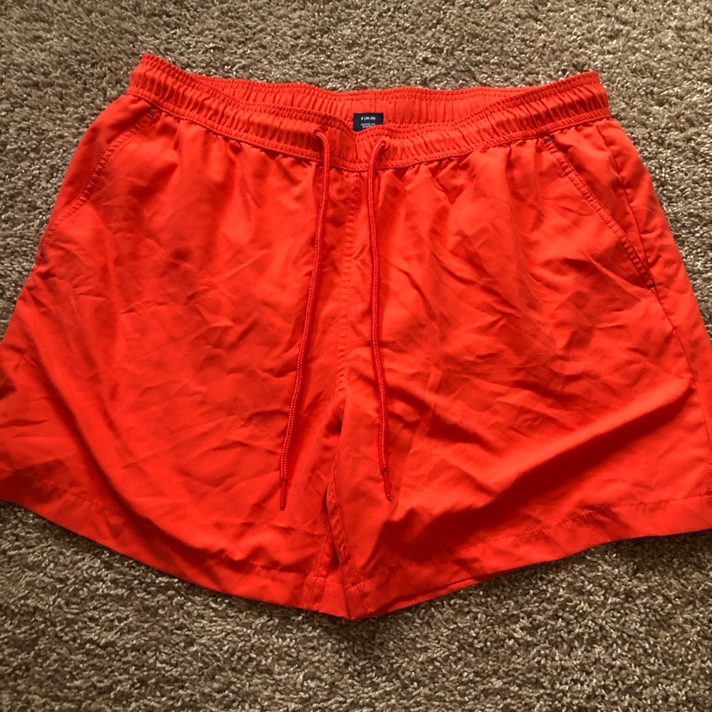 Men’s orange bathing suit